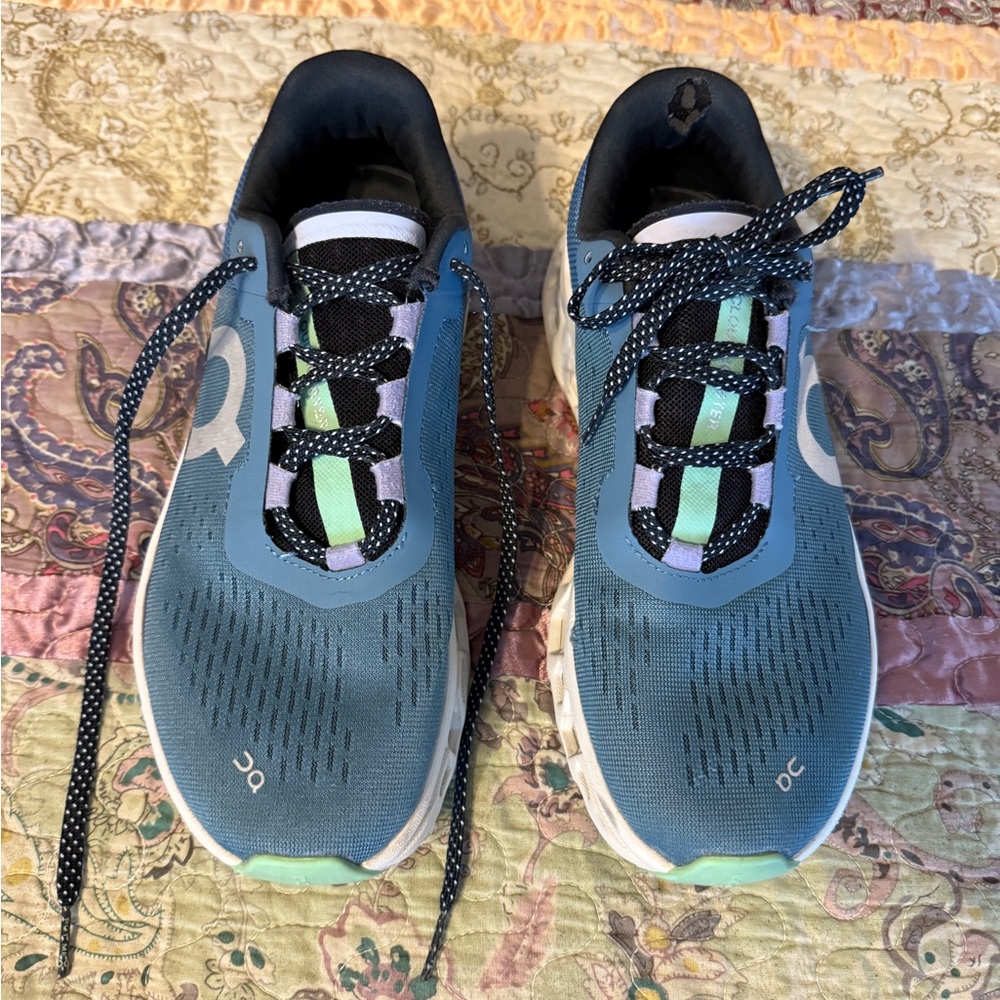 On Running Blue and Black Athletic Shoes